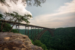 The infamous New River Gorge Bridge captured amid the park on an early summer morning.