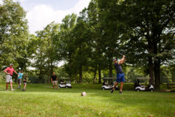 Visitors enjoying the golf course during the summertime in Pipestem Resort State Park.