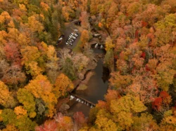 Aerial view of Babcock State Park during peak fall foliage.