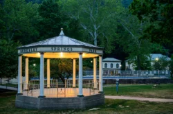 Medium shot of a gazebo at Berkeley Springs State Park in the evening.