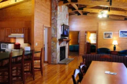 Interior of a cabin showing the living area and bar.