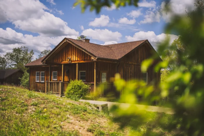 Medium shot of a cabin at Beech Fork State Park during the summer.