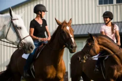 Two women enjoying a riding camp provided at Oglebay Resort in Wheeling, WV.