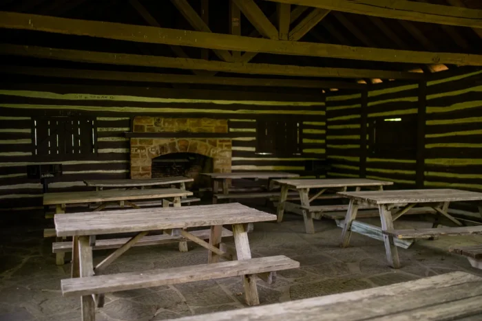 Wide shot of a Lost River State Park picnic shelter captured in the summertime.