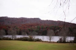 Wide shot of vast fall forestry to be explored for plentiful hunting in or around the Moncove Lake State Park.