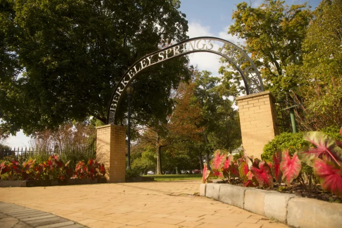 Angled view of arch entrance at Berkeley Springs during the spring or summer.