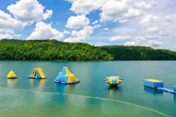 Some of the water-based inflatables on the Tygart Adventure Lake at Tygart Lake State Park.