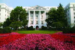 Wide shot of The Greenbrier north entrance during the summer.