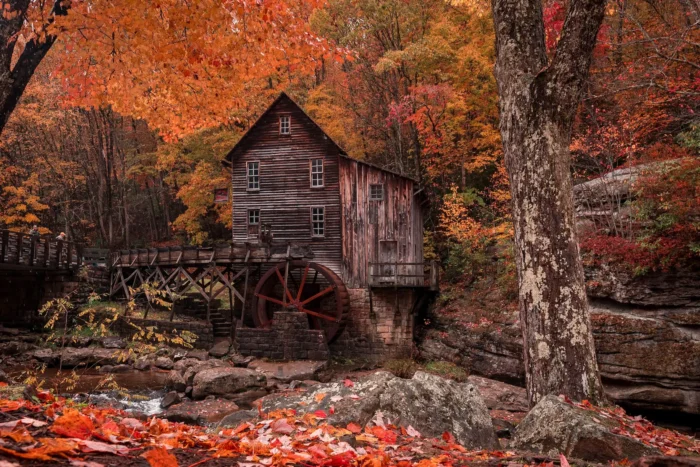 Wide shot of Glade Creek Grist Mill at Babcock State Park during the fall.