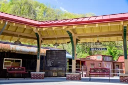 Wide shot of the historic Bramwell Depot during the summer.