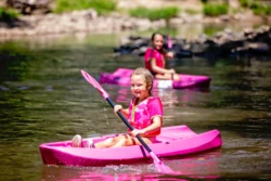 Children kayaking at Camp Creek State Park