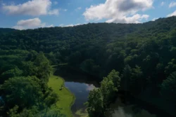Aerial view of lake at Cedar Creek State Park during the summer.