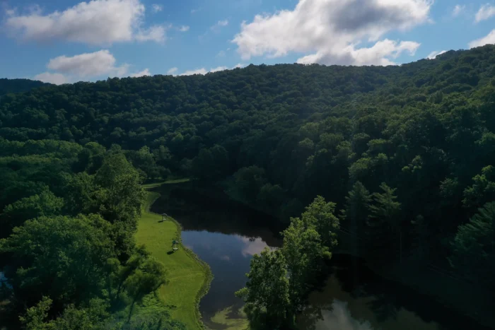 Aerial view of lake at Cedar Creek State Park during the summer.