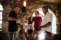 Couple does some wine tasting at Lambert's Vintage Winery.