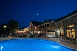 Stonewall outdoor pool at night