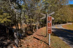 Interpretive sign noting access points on the Greenbrier River Trail during the fall.