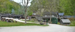 Wide shot of Heritage Farm Museum and Village during active business hours in the summer season.