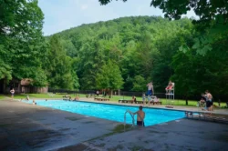 Kids enjoying the outdoor pool at Holly River State Park