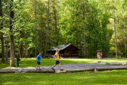 Two boys venturing along one of the designated trails that pass through the cabin area in Greenbrier State Forest.