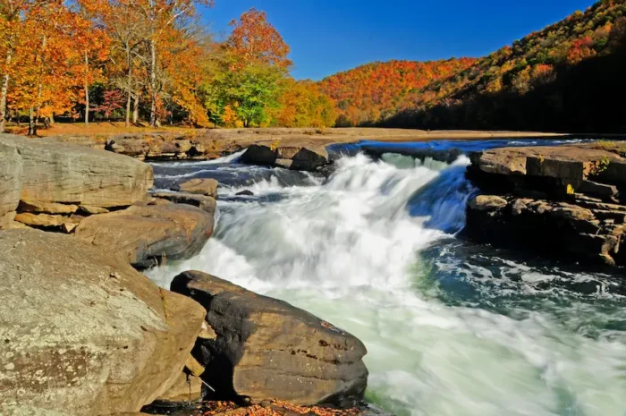 Valley Falls State Park waterfall close-up during autumn season.
