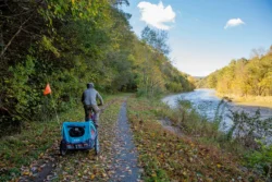 A biker with child in-tow along the Greenbrier River Trail