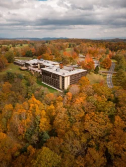 Pipestem Resort State Park lodge surrounded by colorful fall foliage and rolling Appalachian hills